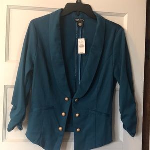 A new never worn large blazer